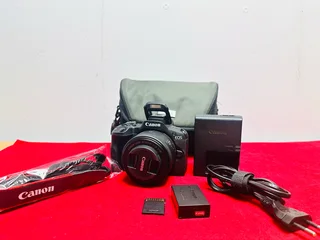 Canon EOS R50 Mirrorless Camera Kit – Like New!  Capture stunning photos and 4K videos