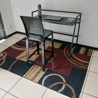 Study table, chair and rug