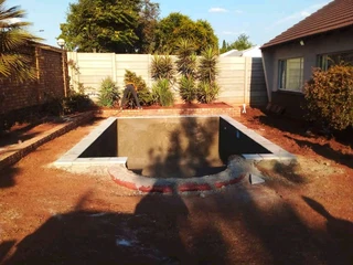 Swimming pools and thatching grass