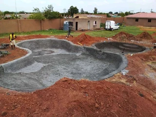 Swimming pools and thatching grass