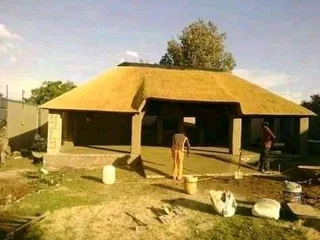 Swimming pools and thatching grass