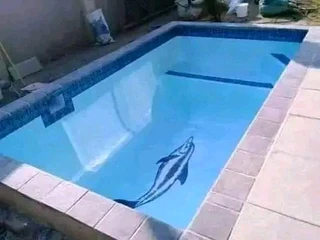 Thatching grass and swimming pools