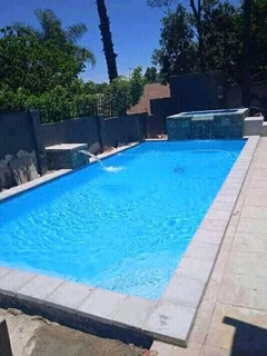 Thatching grass and swimming pools