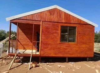 J C timber woodon house