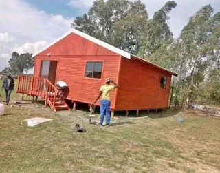 Nutec Homes and Log Homes.