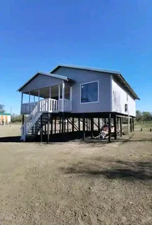 Nutec Home 9m×6m plus extra 3m×2m Balcony with 2 Bedrooms, 1 Bathroom, Kitchen area and Lounge area.