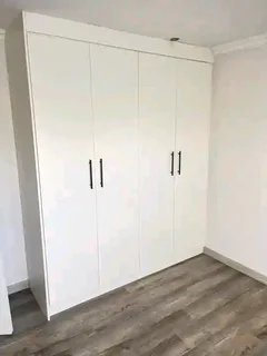 Log Home 11m×8m with 2 Bedrooms, 2 Bathrooms, Open plan Kitchen area, Lounge area and Balcony.