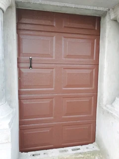 GARAGE DOORS INSTALLATIONS AND AUTOMATIONS