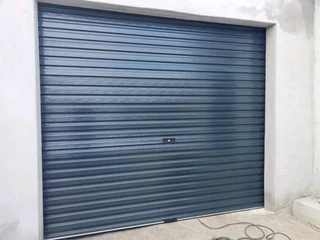 GARAGE DOORS INSTALLATIONS AND AUTOMATIONS