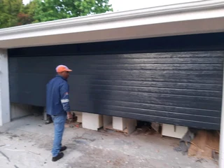 GARAGE DOORS INSTALLATIONS AND AUTOMATIONS