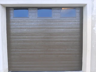 GARAGE DOORS INSTALLATIONS AND AUTOMATIONS