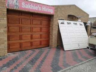 Sectional overhead garage doors installations and Repairs