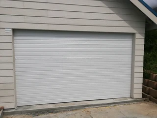 Sectional overhead garage doors installations and Repairs