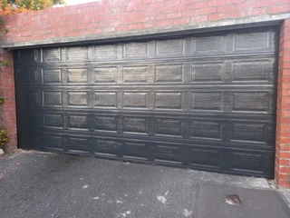 Tip up garage doors installations and Repairs