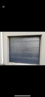 Tip up garage doors installations and Repairs