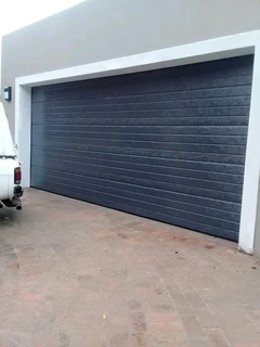 Tip up garage doors installations and Repairs