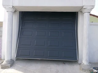 Tip up garage doors installations and Repairs
