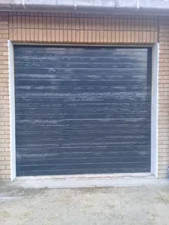 Tip up garage doors installations and Repairs
