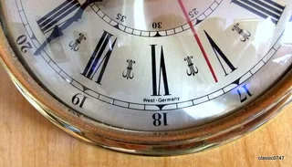 Barometer and Clock in Solid Brass on Wood board Ø 175mm H16mm Overall L 49 x W 24.5 x H 5.2cm kg 3.