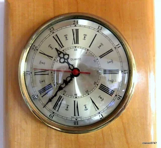 Barometer and Clock in Solid Brass on Wood board Ø 175mm H16mm Overall L 49 x W 24.5 x H 5.2cm kg 3.