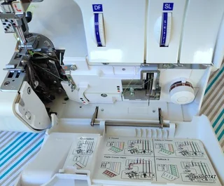 ELNA 745 5trade over locker in excellent condition as NEW