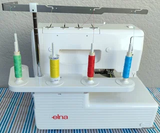 ELNA 745 5trade over locker in excellent condition as NEW