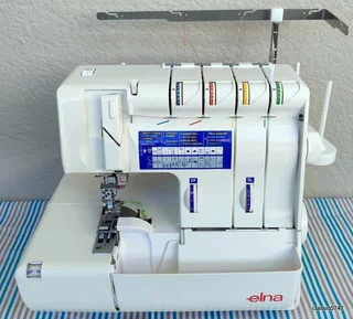 ELNA 745 5trade over locker in excellent condition as NEW