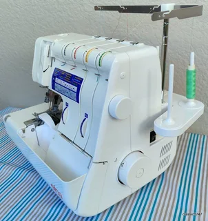 ELNA 745 5trade over locker in excellent condition as NEW