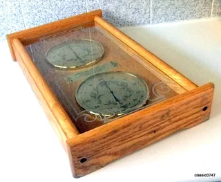 HYGROMETER-THERMOMETER Brass, Ø 15.5cm Overall size Oakwood W30 x D8.5 x H50 cm