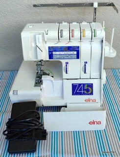 ELNA 745 5trade over locker in excellent condition as NEW