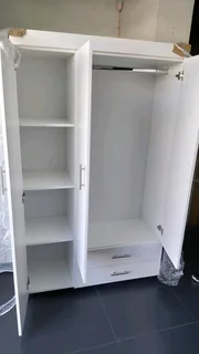 Wardrobes 2500 to 4000. Malemine wood