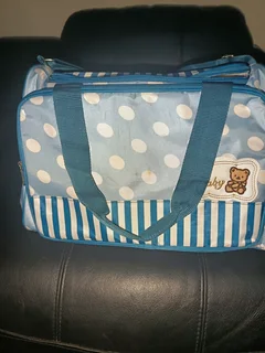 Blue and white used baby bag