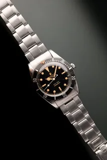 We buy antique Rolexs