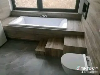 Tiling and bathroom  champions