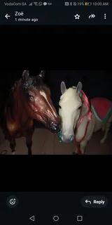 2 Collectible Breyer horses with tack