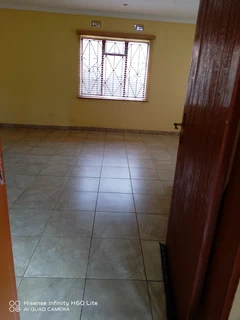 A spacious room fit for a single person