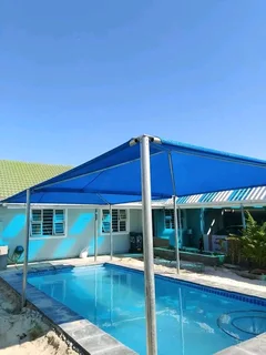 SHADEPORTS And CARPORTS STRUCTURES