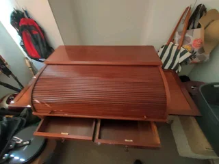 Cherry wood Roller top desk with chair, crafted by Adam Bede. Leather slide out dest top R8800
