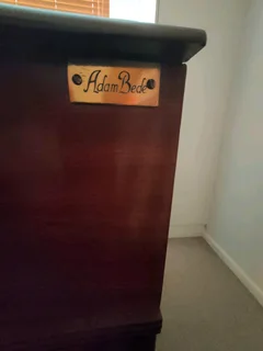 Cherry wood Roller top desk with chair, crafted by Adam Bede. Leather slide out dest top R8800