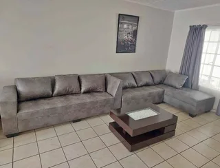 L Shapes couch and Coffee table