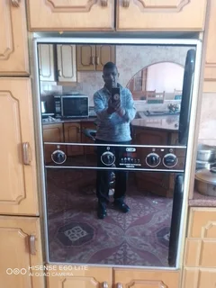 Oven .double..eye level oven.. mirror finish.. good as new..