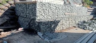 Gabion baskets, Retaining wall, Borehole drilling, Tarring, Paving Fencing, welding, building.
