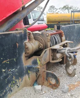 FUSO 15-253 ROLLBACK CRANE TRUCK FOR SALE.