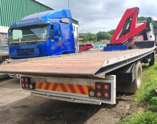 FUSO 15-253 ROLLBACK CRANE TRUCK FOR SALE.