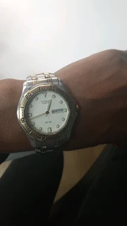 Gold n silver Citizen mans watch water resistant 5500-k09052 cok
