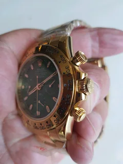 Rolex Gold Daytona Mens Automatic Watch Green Dial