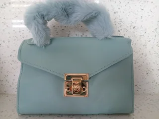 Green handbag in stock