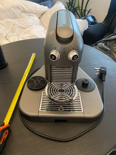 Nespresso Coffee Machine uses Coffee Capsules