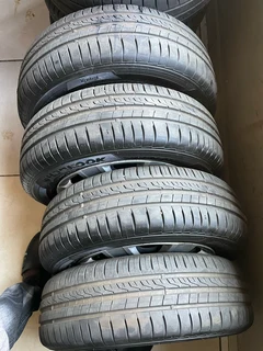 A clean set of 14inch polo steel rims tyres and wheel covers available for sale
