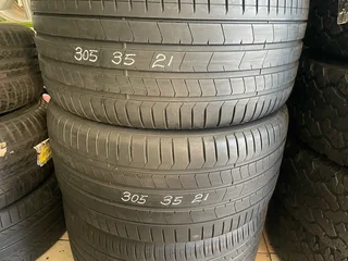 A good set of 305 35 21 and 265 40 21 Pirelli tyres with very good treads available for sale